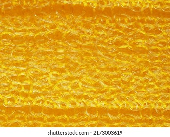 close up, background, texture, large horizontal banner. heterogeneous surface structure bright saturated yellow sponge for washing dishes, kitchen, bath. full depth of field. high resolution photo - Shutterstock ID 2173003619