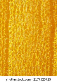 close up, background, texture, large vertical banner. heterogeneous surface structure bright saturated yellow sponge for washing dishes, kitchen, bath. full depth of field. high resolution photo - Shutterstock ID 2177525725
