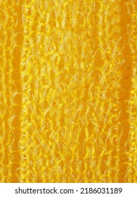 close up, background, texture, large vertical banner. heterogeneous surface structure bright saturated yellow sponge for washing dishes, kitchen, bath. full depth of field. high resolution photo - Shutterstock ID 2186031189