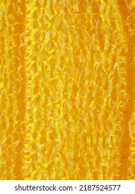 close up, background, texture, large vertical banner. heterogeneous surface structure bright saturated yellow sponge for washing dishes, kitchen, bath. full depth of field. high resolution photo - Shutterstock ID 2187524577