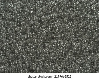 close up, background, texture, large vertical banner. surface structure black expanded polyethylene, EPE, padding cushioning material for packages. full depth of field. high resolution photo - Shutterstock ID 2199668523