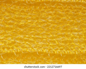 close up, background, texture, large horizontal banner. heterogeneous surface structure bright saturated yellow sponge for washing dishes, kitchen, bath. full depth of field. high resolution photo - Shutterstock ID 2212716697