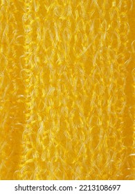 close up, background, texture, large vertical banner. heterogeneous surface structure bright saturated yellow sponge for washing dishes, kitchen, bath. full depth of field. high resolution photo - Shutterstock ID 2213108697