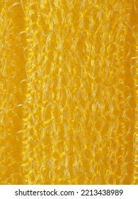 close up, background, texture, large vertical banner. heterogeneous surface structure bright saturated yellow sponge for washing dishes, kitchen, bath. full depth of field. high resolution photo - Shutterstock ID 2213438989