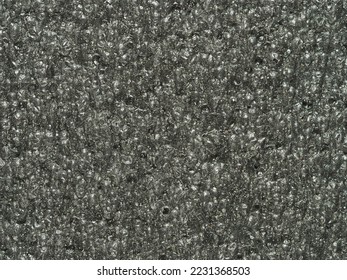 close up, background, texture, large horizontal banner. surface structure black expanded polyethylene, EPE, padding cushioning material for packages. full depth of field. high resolution photo - Shutterstock ID 2231368503