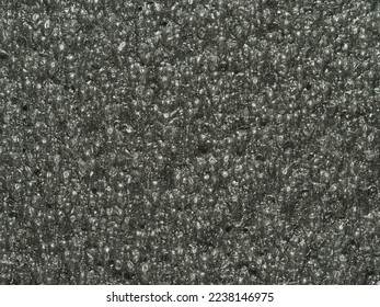 close up, background, texture, large vertical banner. surface structure black expanded polyethylene, EPE, padding cushioning material for packages. full depth of field. high resolution photo - Shutterstock ID 2238146975