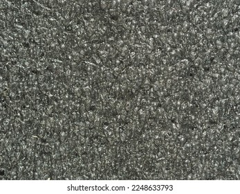 close up, background, texture, large vertical banner. surface structure black expanded polyethylene, EPE, padding cushioning material for packages. full depth of field. high resolution photo - Shutterstock ID 2248633793