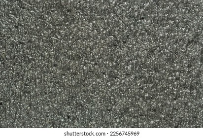 close up, background, texture, large long horizontal banner. surface structure black expanded polyethylene, EPE, padding cushioning material for packages. full depth of field. high resolution photo - Shutterstock ID 2256745969
