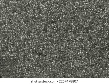 close up, background, texture, large long vertical banner. surface structure black expanded polyethylene, EPE, padding cushioning material for packages. full depth of field. high resolution photo - Shutterstock ID 2257478807