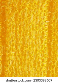 close up, background, texture, large vertical banner. heterogeneous surface structure bright saturated yellow sponge for washing dishes, kitchen, bath. full depth of field. high resolution photo - Shutterstock ID 2303388609