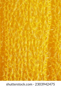 close up, background, texture, large vertical banner. heterogeneous surface structure bright saturated yellow sponge for washing dishes, kitchen, bath. full depth of field. high resolution photo - Shutterstock ID 2303942475