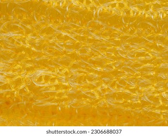 close up, background, texture, large horizontal banner. heterogeneous surface structure bright saturated yellow sponge for washing dishes, kitchen, bath. full depth of field. high resolution photo - Shutterstock ID 2306688037