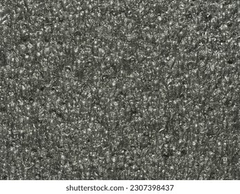 close up, background, texture, large vertical banner. surface structure black expanded polyethylene, EPE, padding cushioning material for packages. full depth of field. high resolution photo - Shutterstock ID 2307398437