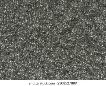 close up, background, texture, large horizontal banner. surface structure black expanded polyethylene, EPE, padding cushioning material for packages. full depth of field. high resolution photo - Shutterstock ID 2308527889