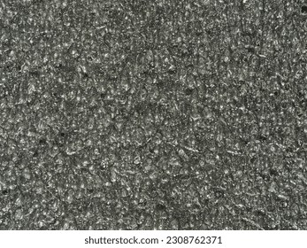 close up, background, texture, large horizontal banner. surface structure black expanded polyethylene, EPE, padding cushioning material for packages. full depth of field. high resolution photo - Shutterstock ID 2308762371