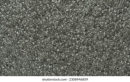 close up, background, texture, large long horizontal banner. surface structure black expanded polyethylene, EPE, padding cushioning material for packages. full depth of field. high resolution photo - Shutterstock ID 2308946859