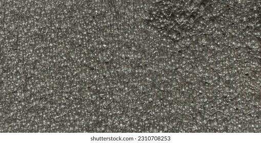 close up, background, texture, large long horizontal banner. surface structure black expanded polyethylene, EPE, padding cushioning material for packages. full depth of field. high resolution photo - Shutterstock ID 2310708253