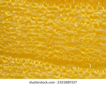 close up, background, texture, large horizontal banner. heterogeneous surface structure bright saturated yellow sponge for washing dishes, kitchen, bath. full depth of field. high resolution photo - Shutterstock ID 2331889337