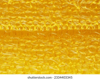close up, background, texture, large horizontal banner. heterogeneous surface structure bright saturated yellow sponge for washing dishes, kitchen, bath. full depth of field. high resolution photo - Shutterstock ID 2334403345