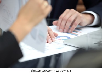 close up. business team analyzes financial data - Shutterstock ID 1243994833