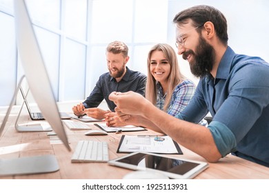 close up. business team discussing financial documents - Powered by Shutterstock