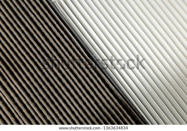 Close up, clean and dirty cabin\
air filter for car. car air filter texture and\
background