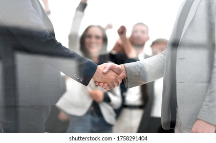 Close Up. Confident Business Handshake On An Office Background.