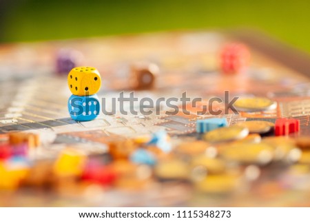 Close up: dices at the table with Board game. Gameplay moments. Random game concept