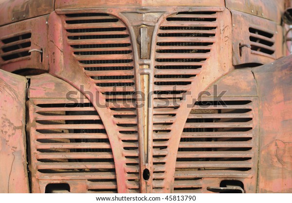Close -up of\
the Front bonnet of an old rusty\
car.