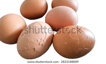 Close up, isolated example of Hardboiled eggs on a surface with the shells rolled and cracked for easy peeling. Close-up of multiple hard-boiled eggs showing the rolling method to crack shells before peeling. Hard-boiled eggs on an isolated background, rolled on a hard surface to crack the shell for easy peeling. Photo of Cooled and gently tapped hardboiled eggs showing the roll and crack technique against a clean background.