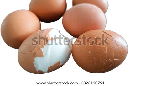 Close up, isolated example of Hardboiled eggs on a surface with the shells rolled and cracked for easy peeling. Close-up of multiple hard-boiled eggs showing the rolling method to crack shells before peeling. Hard-boiled eggs on an isolated background, rolled on a hard surface to crack the shell for easy peeling. Photo of Cooled and gently tapped hardboiled eggs showing the roll and crack technique against a clean background.