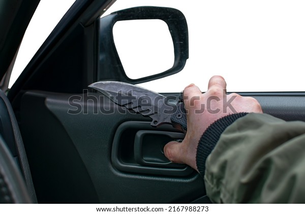 close up, a knife in the\
hand of a man who opens a car door on an empty, clean white\
isolated background
