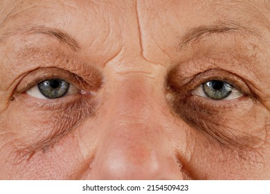 Close up, macro photo of a senior female color eyes, iris, pupil, eye lashes, eye lids. - Shutterstock ID 2154509423