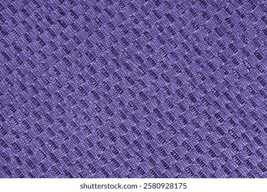 Close up, macro structure, texture of purple jacquard fabric of diagonal rough weave. Material for home textile, upholstery and curtain decor, garment. Background, wallpaper, backdrop.