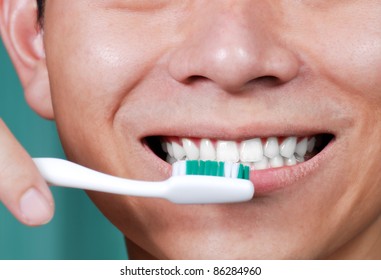 Close Up, Man Brushing His Teeth