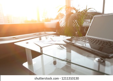 Close Up. Open Laptop On The Table In The Lobby Of A Modern Bank