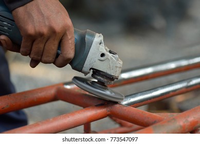 Close Up, Removing Rust And Old Paint From Metal With Angle Grinder