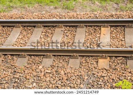 Close up, selective focus photo of railway track or railroad or rel kereta api