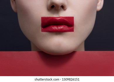 Close up, young woman lips with avant garde fashion art makeup. Red lips - Shutterstock ID 1509826151