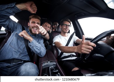 Close Up.happy Friends Talking In The Car.