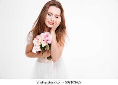 Close Up Upset Bride. With Bouquet