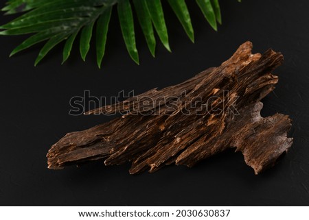 Close UpShot Of Sticks Of oudh On Black Background The Incense Chips Used By Burning It Or For Arabian Oud Oils Or Bakhoor