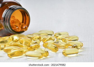 Close up(Zoom) of Capsules gel Fish oil on white background view. Salmon fish capsule gels. Supplementary food health. Omega(Omega 3). Copy space. - Shutterstock ID 2021479082