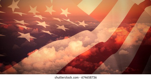 Close Up Of The Us Flag Against Full Frame Image Of Cloudy Sky