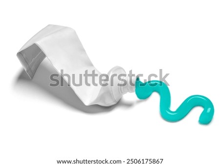 close up of  a used empty toothpaste tube on white background