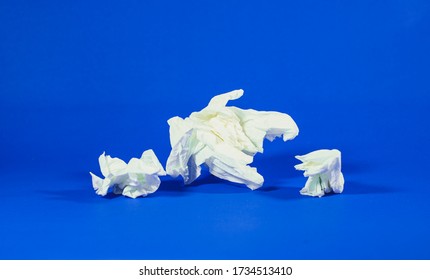 Close Up Used Tissues Paper On Blue Background