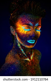 close up uv portrait glowing in a dark female model