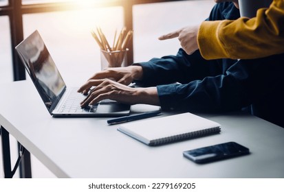 Close up ux developer and ui designer use augmented reality brainstorming about mobile app interface wireframe design on desk at modern office.Creative digital development agency