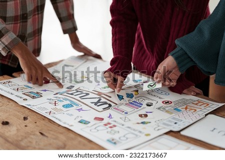 Similar – Image, Stock Photo Young friends looking map over a table