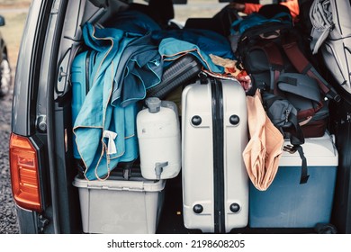 Close up of a van filled with suitcase, bag and road trip stuff ready to start the route traveling across iceland. Sleeping outdoors, camping and exploring concepts. Copy space Image.
